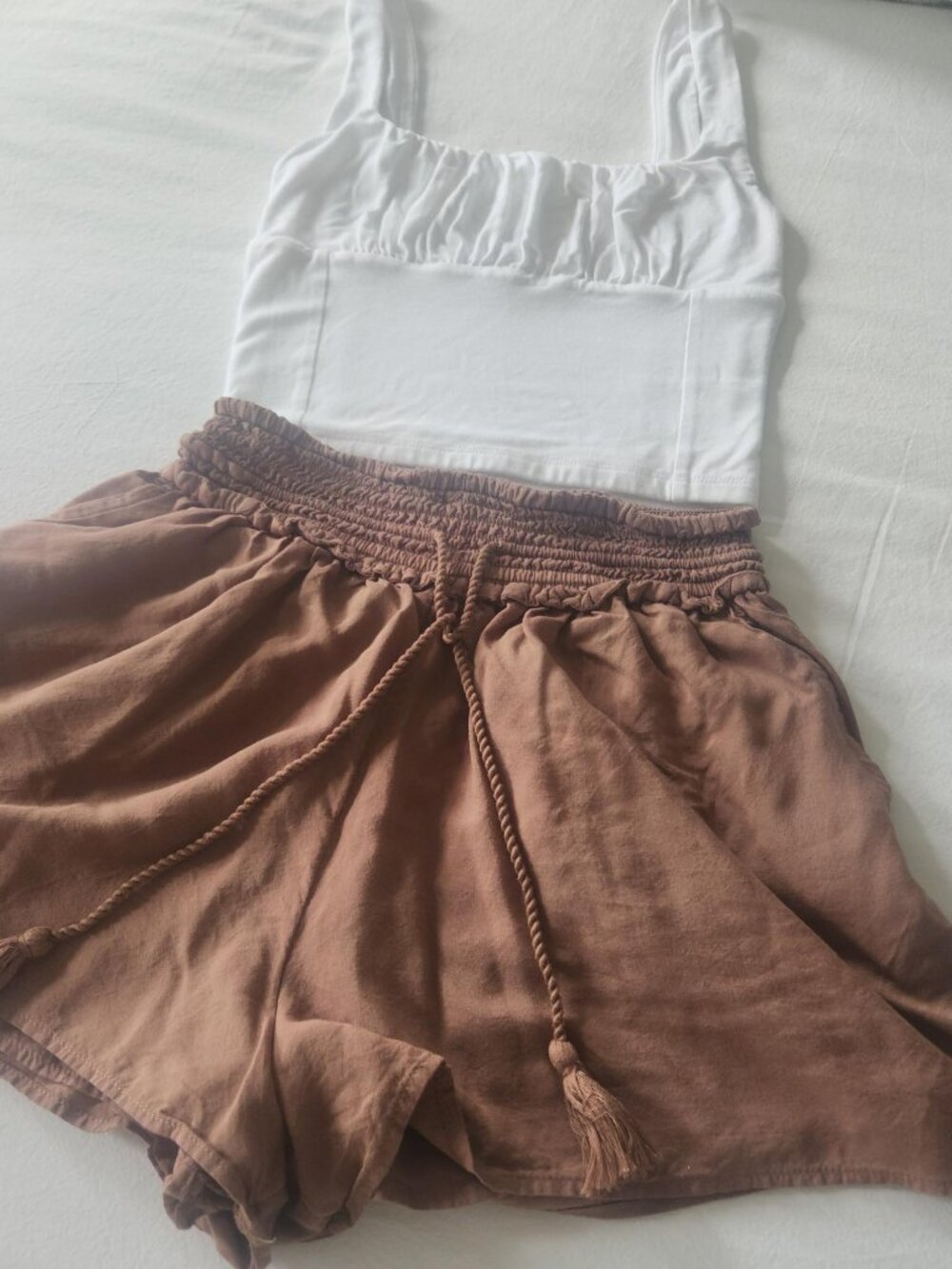 Summer outfit. Perfect condition and includes shorts and top